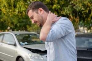 Driver suffering from neck injury from car accident. in Bremen, GA