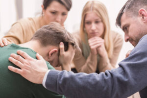 Depressed man in counseling session.