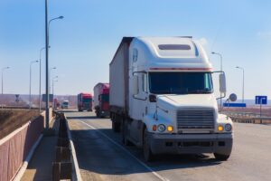 Trucks passing the bridge.