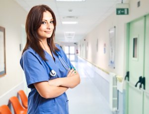 nurse standing in hallway of a hospital