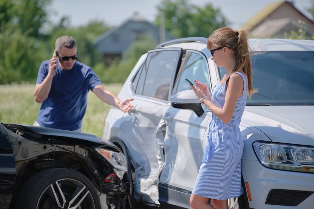 Two drivers involved in the accident arguing whos fault.